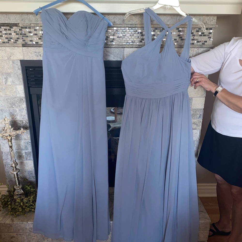 Two dusty blue bridesmaids dresses